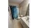 Bathroom with toilet, sink, shower, and wallpaper at 1014 Mimosa Ct., Conway, SC 29527