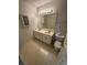 Bathroom features a double vanity with bright lighting and a standard toilet at 1014 Mimosa Ct., Conway, SC 29527