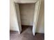 Walk-in closet with white shelving units and double doors to maximize the available space at 1014 Mimosa Ct., Conway, SC 29527