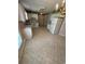 Traditional kitchen with white appliances, cabinets, and patterned wallpaper at 1014 Mimosa Ct., Conway, SC 29527