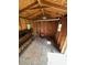 Inside shed featuring plywood walls, shelving, and ample storage space at 1014 Mimosa Ct., Conway, SC 29527