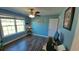 Bedroom featuring a ceiling fan, natural light, and stylish vinyl flooring at 1210 Horry Rd., Aynor, SC 29511