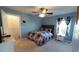 Bedroom with a patriotic themed comforter set, closet, and bright window at 1210 Horry Rd., Aynor, SC 29511