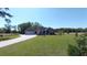 Exterior of a well-maintained home with a spacious lawn, garage, and inviting curb appeal at 1210 Horry Rd., Aynor, SC 29511