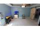 Spacious main bedroom with carpeting, ceiling fan, and sliding barn door closet at 1210 Horry Rd., Aynor, SC 29511