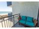 Comfortable balcony seating features views of the beach at 2001 S Ocean Blvd. # 207, Myrtle Beach, SC 29577