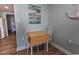 Cozy dining area with coastal decor that transitions into the bedroom at 2001 S Ocean Blvd. # 207, Myrtle Beach, SC 29577