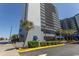 Beachfront condominium building with multiple stories, balconies, and palm trees at 2001 S Ocean Blvd. # 207, Myrtle Beach, SC 29577
