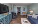 Relaxing living room showcasing a TV, comfortable seating, and bright coastal decor at 2001 S Ocean Blvd. # 207, Myrtle Beach, SC 29577