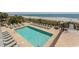 The outdoor pool is surrounded by lounge chairs and has stunning ocean views at 2001 S Ocean Blvd. # 207, Myrtle Beach, SC 29577