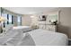 Comfortable hotel suite bedroom with two queen beds, TV, and ocean view at 2701 N Ocean Blvd. # 1154-60, Myrtle Beach, SC 29577