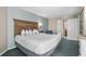 Comfortable bedroom with king-size bed, soft lighting, and ensuite bathroom at 2701 N Ocean Blvd. # 1154-60, Myrtle Beach, SC 29577