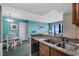 A kitchen with an eat-in area looks out into a dining area, living room and ocean view at 2701 N Ocean Blvd. # 1154-60, Myrtle Beach, SC 29577