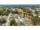A scenic aerial perspective of the community with golf course and numerous homes surrounded by lush trees at 3004 Fiddler Ct., Loris, SC 29569