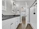 Bathroom features double sinks with granite countertops and a tub and shower combo at 3004 Fiddler Ct., Loris, SC 29569