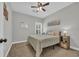 Bedroom with ceiling fan, carpeted floors, and a side table at 3004 Fiddler Ct., Loris, SC 29569