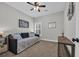 Bedroom with carpeted floors, a day bed, and a ceiling fan at 3004 Fiddler Ct., Loris, SC 29569