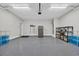 Spacious garage with epoxy flooring, ample storage, and room for multiple vehicles at 3004 Fiddler Ct., Loris, SC 29569