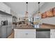 Stylish kitchen island with a view of the open-concept living and dining area at 3004 Fiddler Ct., Loris, SC 29569