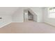 Large bonus room offering ample space with neutral carpet, and natural light at 348 Autumn Pheasant Loop, Calabash, NC 28467