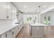 Bright kitchen featuring white countertops, stainless steel appliances, and an island at 348 Autumn Pheasant Loop, Calabash, NC 28467