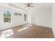 Bright main bedroom featuring hardwood floors, a ceiling fan, and recessed lights at 348 Autumn Pheasant Loop, Calabash, NC 28467