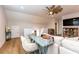 Bonus room features vaulted ceilings, a TV, desk, and storage for hobbies at 402 Bumble Circle, Murrells Inlet, SC 29576