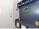 Well-organized entryway features built-in storage bench, cubbies, and stylish decor with storage baskets at 402 Bumble Circle, Murrells Inlet, SC 29576