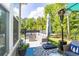 Outdoor patio features upscale seating, and manicured lawn with fenced perimeter perfect for entertaining at 402 Bumble Circle, Murrells Inlet, SC 29576