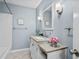 Bright bathroom featuring modern fixtures, a single vanity and shower-tub combo at 5508 Porcher Dr. # 3, Myrtle Beach, SC 29577