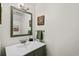 Bathroom with vanity, framed mirror, and decorative accents at 5508 Porcher Dr. # 3, Myrtle Beach, SC 29577