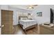 Serene bedroom featuring a queen bed, natural light, and neutral decor at 5508 Porcher Dr. # 3, Myrtle Beach, SC 29577