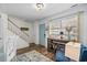 Bright entryway with staircase, desk, and stylish decor at 5508 Porcher Dr. # 3, Myrtle Beach, SC 29577