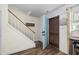 Bright entryway featuring stairs, and a door with decor accents and hardwood floors at 5508 Porcher Dr. # 3, Myrtle Beach, SC 29577
