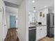 Modern kitchen featuring stainless steel appliances, ample counter space, and stylish fixtures at 5508 Porcher Dr. # 3, Myrtle Beach, SC 29577