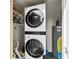 Efficient laundry space with stacked washer and dryer, optimizing convenience at 5508 Porcher Dr. # 3, Myrtle Beach, SC 29577