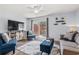 Cozy living room with modern decor, comfortable seating, and sliding glass doors to the outside at 5508 Porcher Dr. # 3, Myrtle Beach, SC 29577