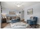 Well-lit living room with plush seating, stylish decor, and neutral color palette at 5508 Porcher Dr. # 3, Myrtle Beach, SC 29577