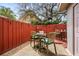 Back patio with dining tables and chairs for outdoor relaxation at 5508 Porcher Dr. # 3, Myrtle Beach, SC 29577