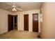Bedroom featuring neutral walls, ceiling fan, and closet doors, providing an overview of the room's layout at 1001 Creel St., Conway, SC 29527