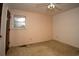 Bedroom featuring neutral walls, a window, and closet doors, highlighting the room's layout and natural light at 1001 Creel St., Conway, SC 29527