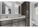 Bathroom with double sinks, dark cabinets, and modern finishes at 103 Off Shore Dr., Murrells Inlet, SC 29576