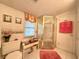 Bathroom with a glass door shower, floral window, and tiled floor at 106 Jessamine St., Andrews, SC 29510