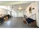 Spacious garage with multiple doors and ample room for parking and storage, including access stairs at 106 Jessamine St., Andrews, SC 29510