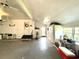 Open garage space, perfect for parking and storage, with windows providing natural light plus entry doors at 106 Jessamine St., Andrews, SC 29510