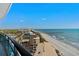 View from balcony with a pier view, clear blue skies, and coastal city landscape with a pool at 107 S Ocean Blvd. # 1201, Myrtle Beach, SC 29577