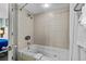 Bathroom with a tub featuring jets and a shower with a tile surround at 107 S Ocean Blvd. # 1201, Myrtle Beach, SC 29577