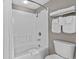 Clean, well-lit bathroom with a shower/tub combination and fresh towels at 107 S Ocean Blvd. # 1201, Myrtle Beach, SC 29577