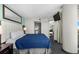Tastefully decorated bedroom features a queen bed and access to the balcony at 107 S Ocean Blvd. # 1201, Myrtle Beach, SC 29577