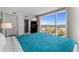 Bedroom with expansive windows providing natural light and panoramic neighborhood views at 107 S Ocean Blvd. # 1201, Myrtle Beach, SC 29577